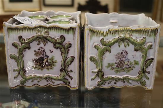 A pair of French faience bough pots and covers, 19th century, height 5in.